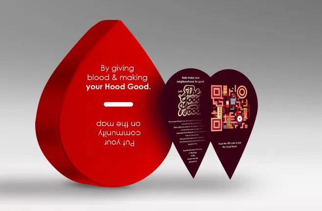 Red blood donation display with heart-shaped campaign panels
